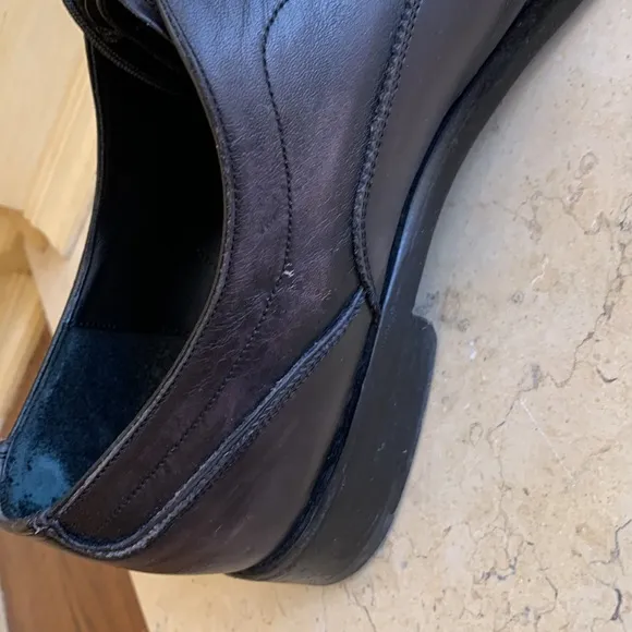 Salvatore Ferragamo black oxfords. Lace up. Detailing on front. Sz 11 1/2.