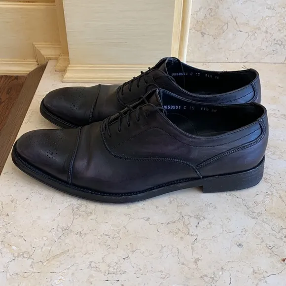 Salvatore Ferragamo black oxfords. Lace up. Detailing on front. Sz 11 1/2.