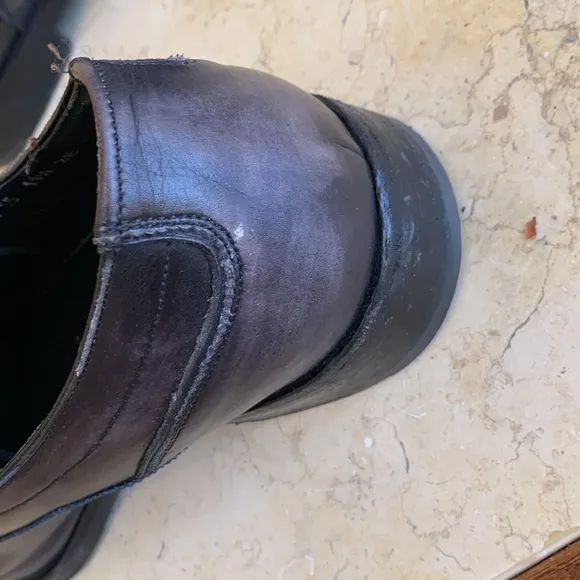 Salvatore Ferragamo black oxfords. Lace up. Detailing on front. Sz 11 1/2.