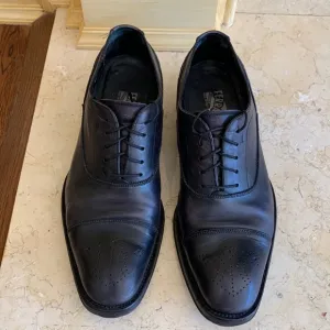 Salvatore Ferragamo black oxfords. Lace up. Detailing on front. Sz 11 1/2.
