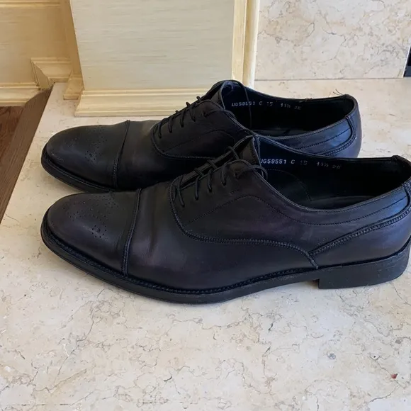 Salvatore Ferragamo black oxfords. Lace up. Detailing on front. Sz 11 1/2.