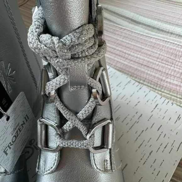 Sorel Disney wedge boots. Nib
