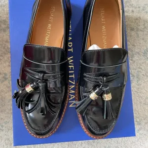 Stuart Weitzman Black Tassel Loafers for Men