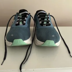 Teal and Black Running Shoes