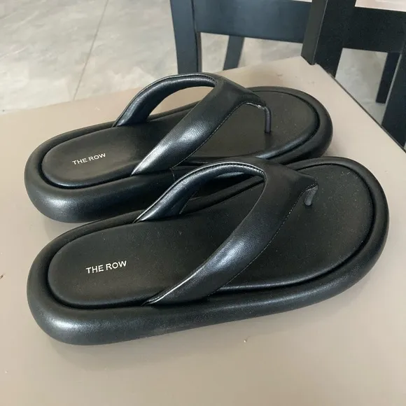 The Row Black Leather Sandals