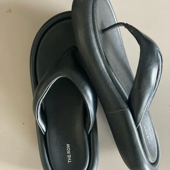 The Row Black Leather Sandals