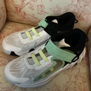 These Nike sneakers were barely worn before out growing.