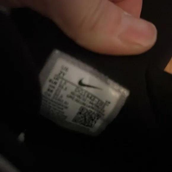 These Nike sneakers were barely worn before out growing.