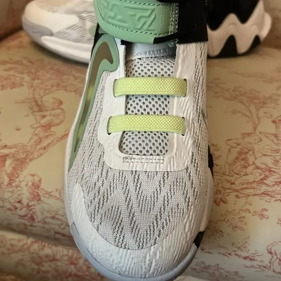 These Nike sneakers were barely worn before out growing.