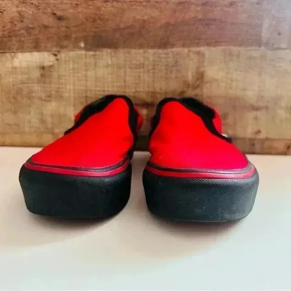 Vans Customized Slip Ons With Smokinhot Vapors Written On The Back Of The Shoes