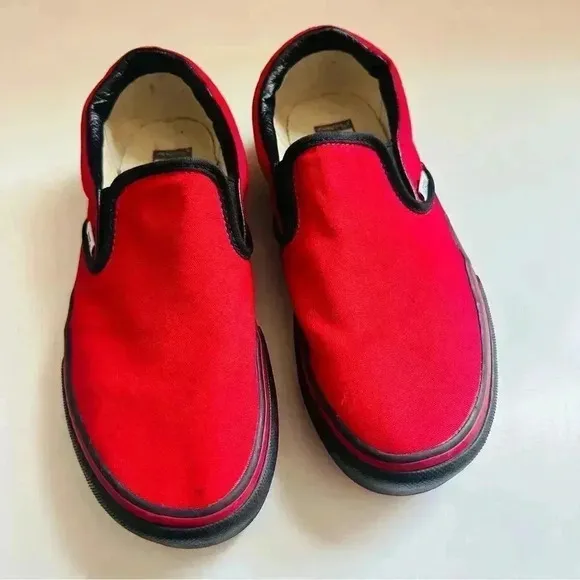 Vans Customized Slip Ons With Smokinhot Vapors Written On The Back Of The Shoes