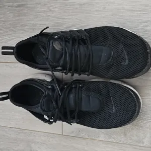 Well Worn Nike Sneakers