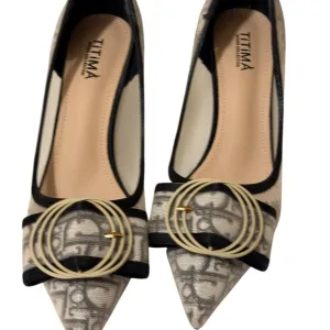 Women's Black and Cream Heels