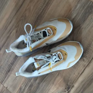 Women's Size 9 Nike Wild Air Max Sneakers. Tan And Golden Yellow Sneakers.